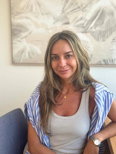 Carolina Maleski, clinical psychologist, smiling to camera.